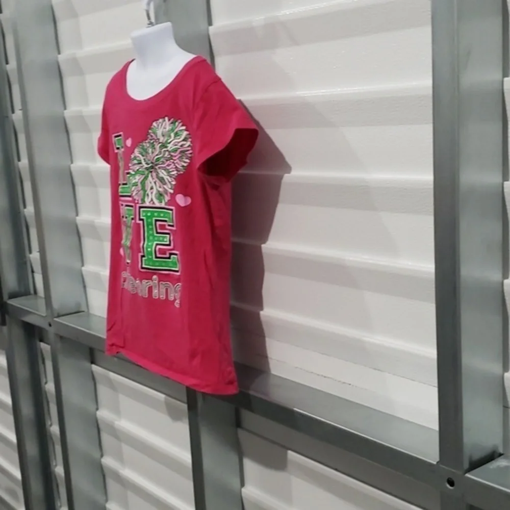 Cheerleading tshirt size 14/16‎